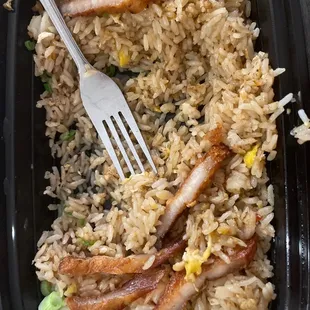 $18 for Crispy Pork Belly Fried Rice....   The portions of the pork are insanely small now.