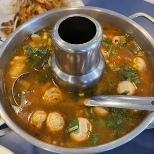 a bowl of soup on a table
