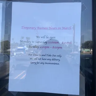 a sign in the window of a business
