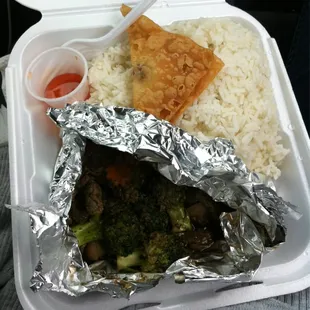 $5 garlc beef lunch special. So yummy, good size and great price. Missing one wonton...it's in my belly.