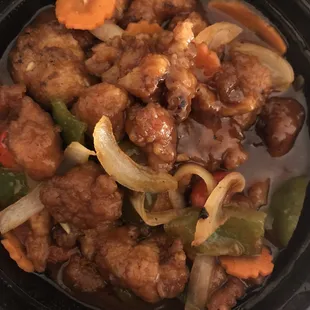 Sweet and Sour Chicken to-go comes dressed with sauce and veggies, not just a tub of pink goo to pour over plain chicken