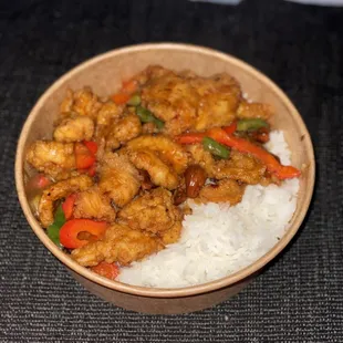 a bowl of chicken and rice