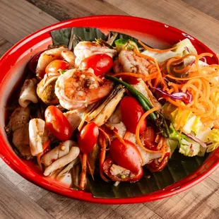 a bowl of shrimp and vegetables