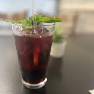 Hibiscus tea.  It comes sweetened.  Refreshing!