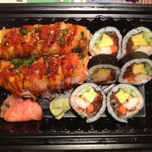 Isn&apos;t this beautiful sushi? Really delicious too! Golden Dragon Roll and Futomaki Roll.