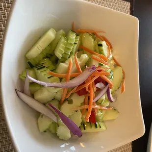 Cucumber salad.  The dressing was a bit too sweet, but good if you didn&apos;t dig deep into the bowl.