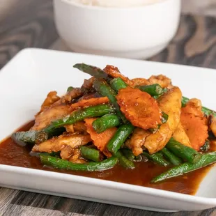 Pad-Prik-King: Protein tossed with Crispy Green Beans ,Carrot and zesty chili paste sauce. Served with Rice