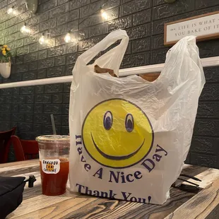 a plastic bag with a smiley face on it