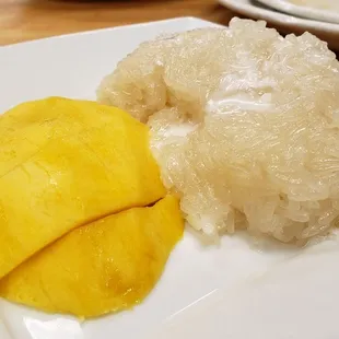 Mango sticky rice ($7), vegan by default. Not great. Old mango, and bland rice w/o enough coconut milk.