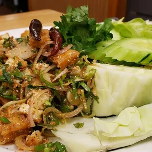 Larb ($11), made vegan w/o fish sauce. Super spicy and delicious. Best dish on the menu.