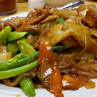 Pad see ew ($13), made vegan w/o egg &amp; fish sauce. Savory and tasty.