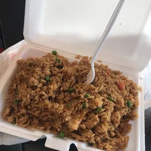 rice and peas in a styrofoam container
