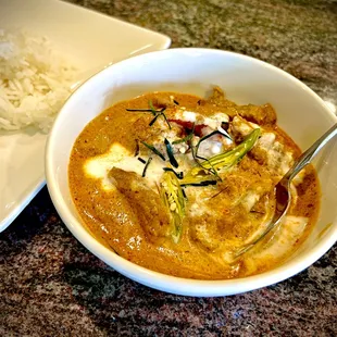 a bowl of curry and rice