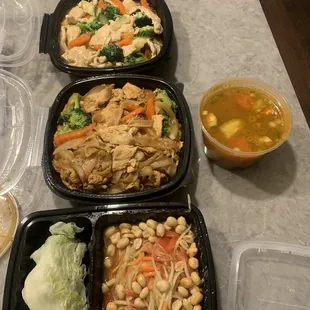 Papaya salad, pad see eiw, lard nar, and tom yum