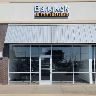 the front entrance of a restaurant