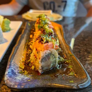a sushi roll on a plate