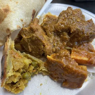Samosa and curries of beef, goat and beef