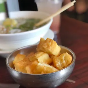 a bowl of chinese food