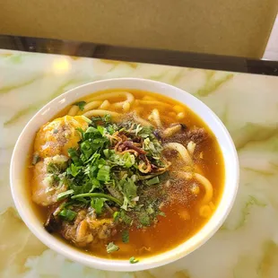 Add black pepper and fish sauce to taste