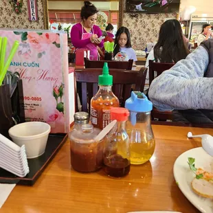 a table with a variety of condiments