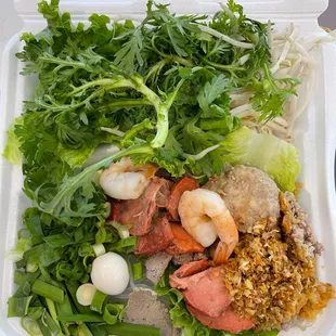 Vermicelli With Grilled Pork and Egg Roll (Bun Thit Nuong Cha Gio). Delivery. Look at all the fresh ingredients!