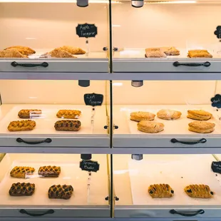 a display case full of pastries
