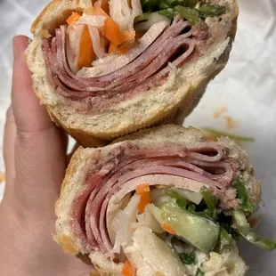 Ham and pork cake sandwich (aka dac biet aka #2 combo)! With extra pate and extra cilantro and jalapeños is a must have for me!  Yum!!