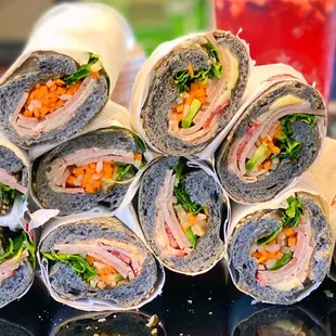 a stack of wraps on a table