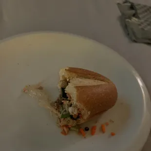 Food was delicious. Large piece of plastic in my sandwich that I choked on.