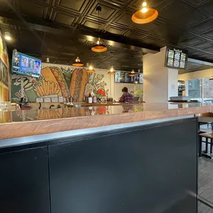 a view of a restaurant with a bar