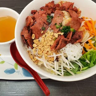 Bún Tôm Thịt Nướng Chả Giò -- Vietnamese rice noodle (bún) dish with barbecued pork (thịt nướng) and shrimp (tôm).