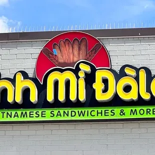 a sign for a vietnamese sandwich and more