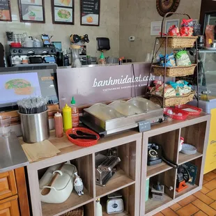 a counter with a variety of food items