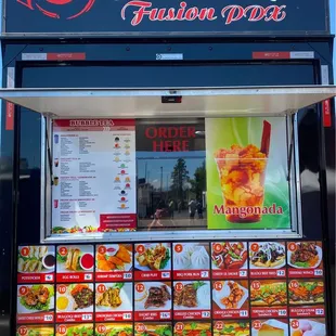 a food truck with menus