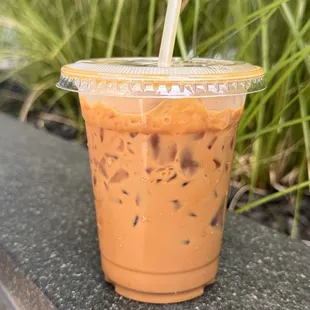 Vietnamese Iced Coffee (sipped some already) - so delicious!!  Get it!!