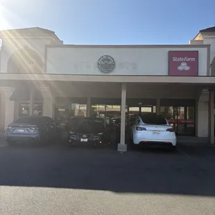 Front of the business, hidden in the corner of Fowler and Ashlan.