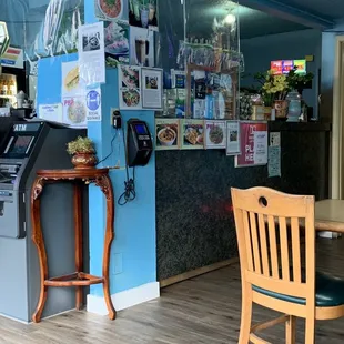 a cash machine and a table