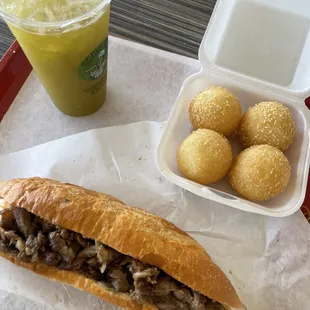 Grilled pork Banh Mi, sugar cane juice, sesame balls