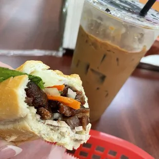 Half eaten #9 - pork roll and grilled pork with the most delicious Vietnamese iced coffee