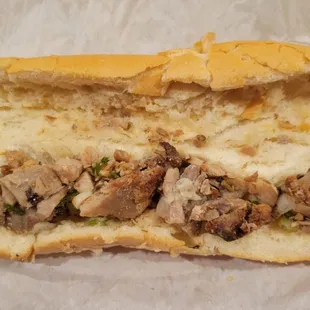 Grilled pork banh mi. That's all of meat you get. No grill flavor. Weak pork flavor. Baguette is badly cracked.