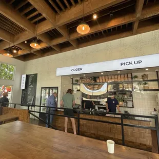 people standing in line at the counter