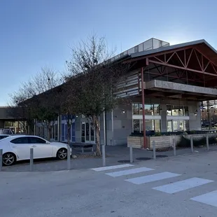 a car parked in front of the station