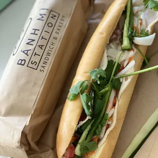 Pork belly and ham banh mi (showing).