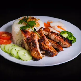 Our signature dish, coconut rice w. Chicken. You will happy w. This dish.