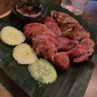 Spicy sausage was dry and the &quot;elevated&quot; presentation was thrown off by the plastic sauce container.