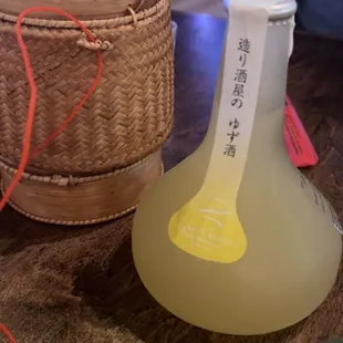 Sake and small portions of sticky rice.