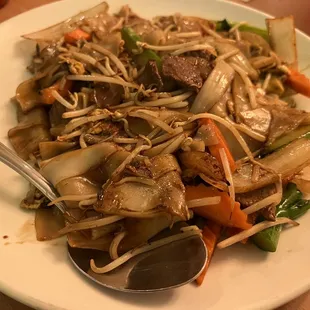 a plate of stir fried vegetables