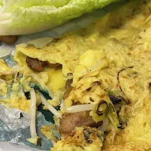 Bahn xeo it was too hot I guess the gummy crepes seemed undercooked and blended with the serving paper