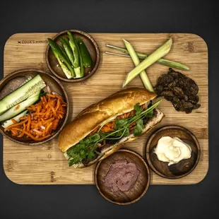 a sub sandwich with various toppings