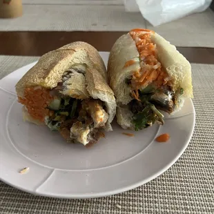 a sandwich cut in half on a plate